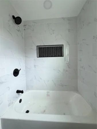 a bathroom with a bathtub