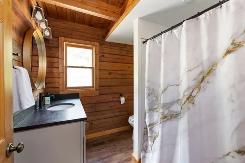 a room with furniture and a window