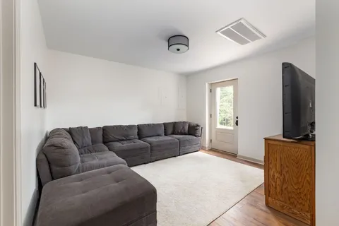 a view of a yard with swimming pool