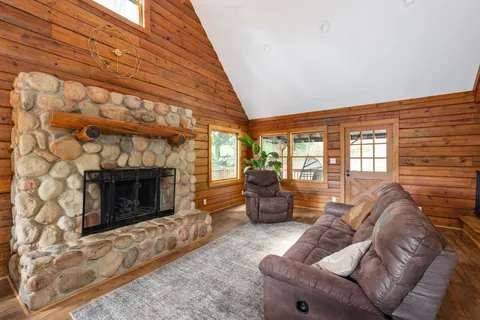 a kitchen with stainless steel appliances a refrigerator and cabinets
