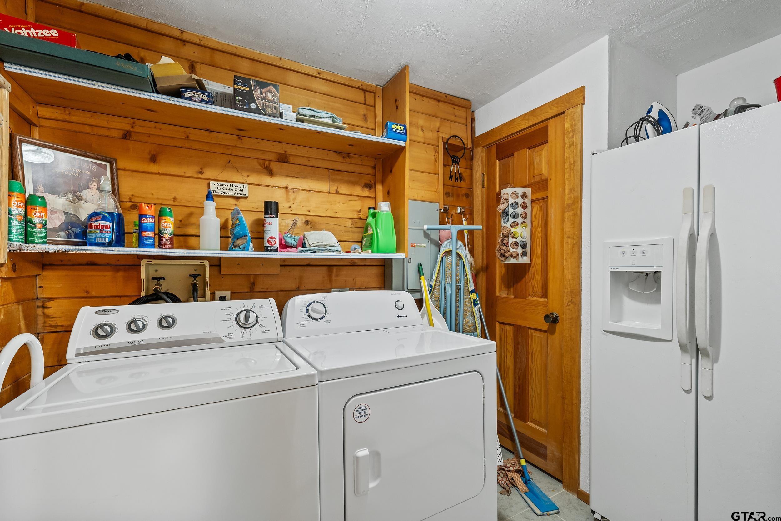 325 Laurel Lane Holly Lake Ranch, TX 75765 - Photo 19 of 34 a utility room with dryer and washer