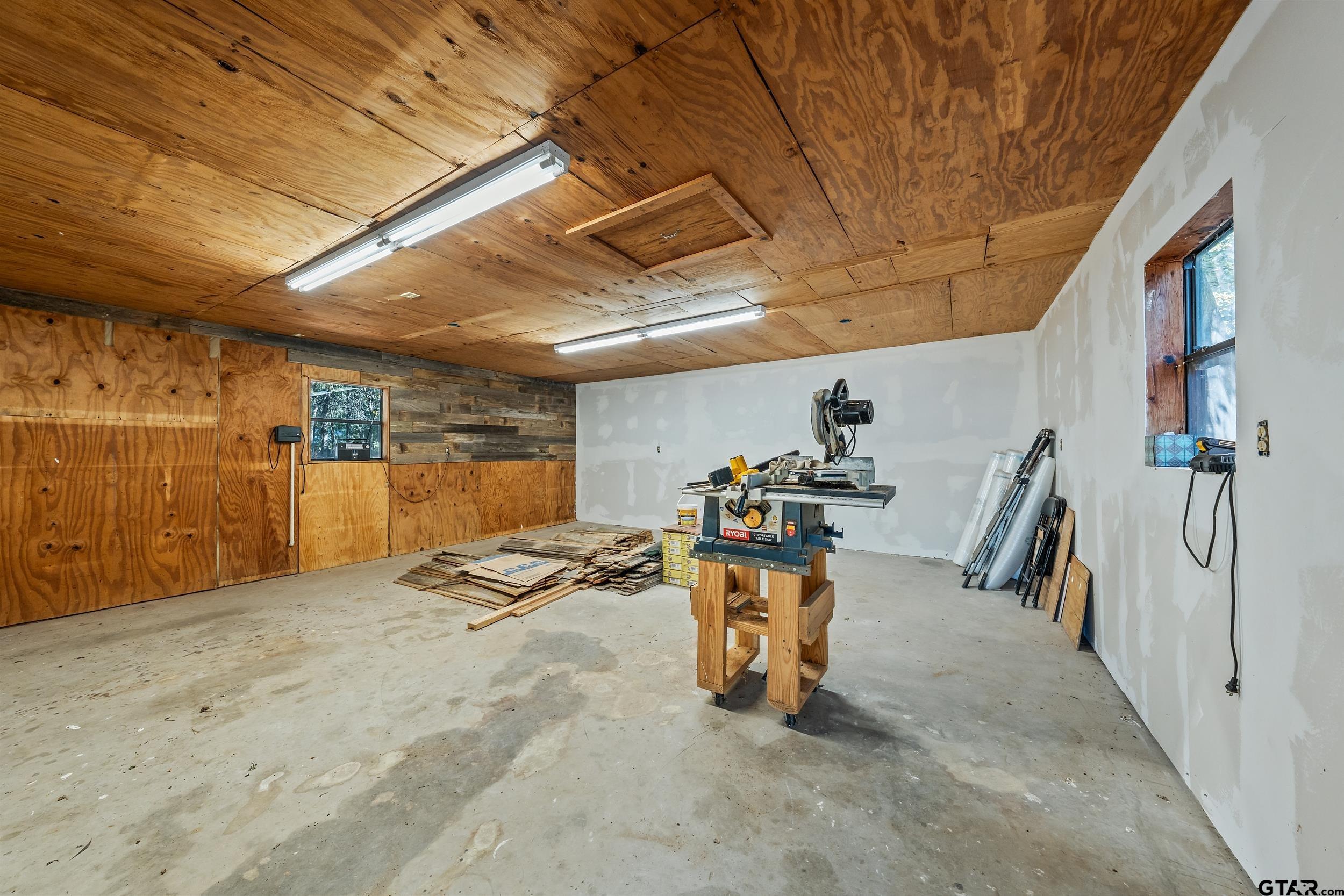 325 Laurel Lane Holly Lake Ranch, TX 75765 - Photo 33 of 34 a view of a room with gym equipment