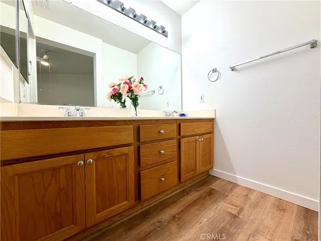 a white toilet sitting next to a bath tub