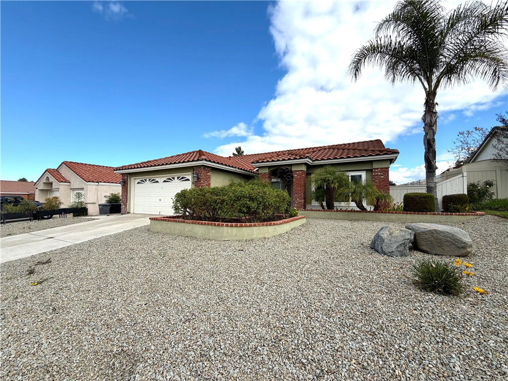 44836 Marge Place Temecula, CA 92592 - Photo 2 of 35 a house with palm tree in front of it