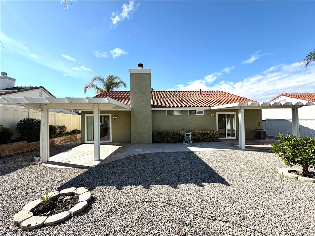 44836 Marge Place Temecula, CA 92592 - Photo 27 of 35 a front view of a house with a yard and table