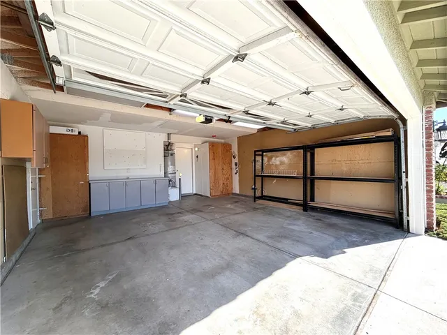 a view of a swimming pool with an outdoor space and seating area