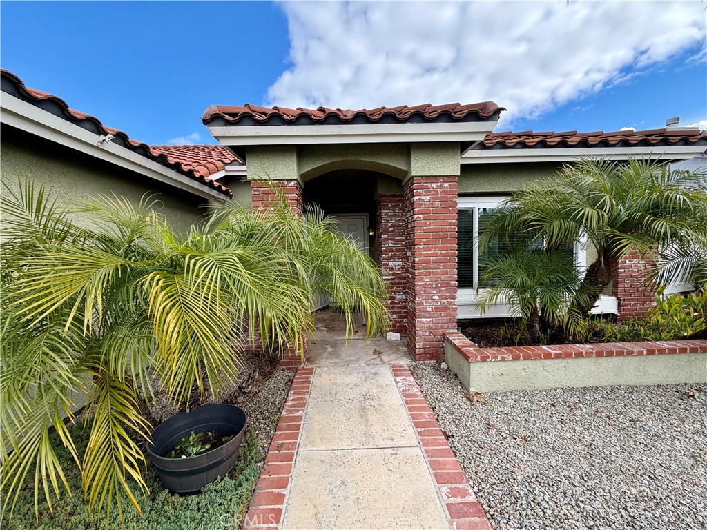 44836 Marge Place Temecula, CA 92592 - Photo 4 of 35 a view of a patio with table and chairs with wooden floor