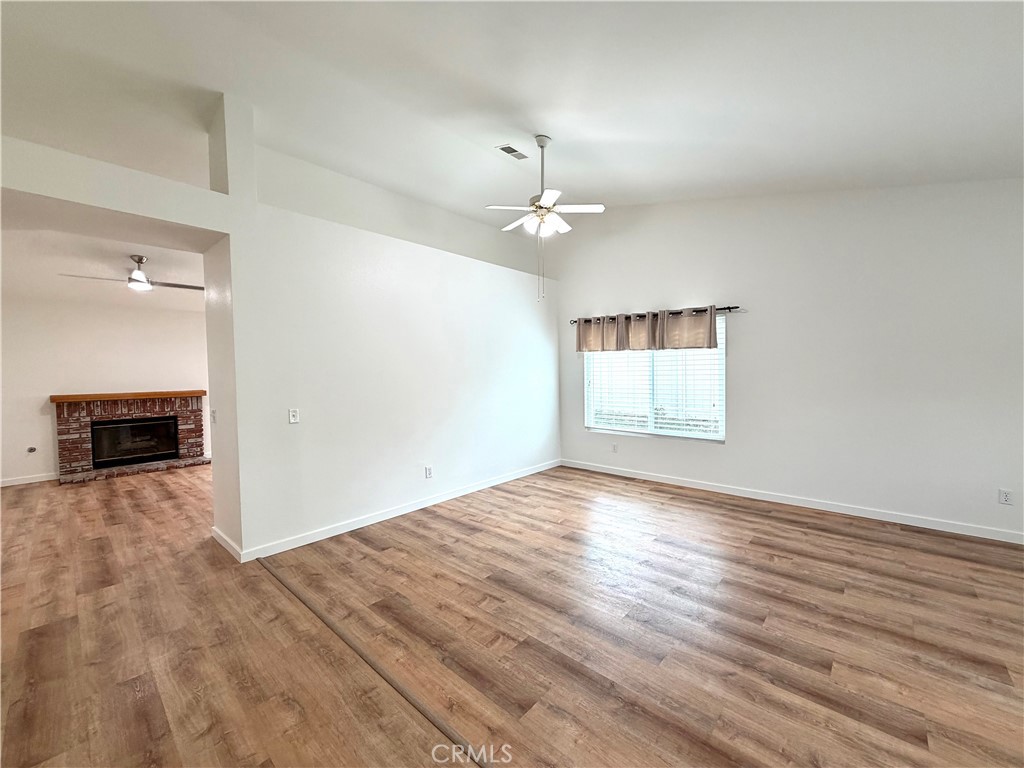 44836 Marge Place Temecula, CA 92592 - Photo 7 of 35 wooden floor in an empty room with a window