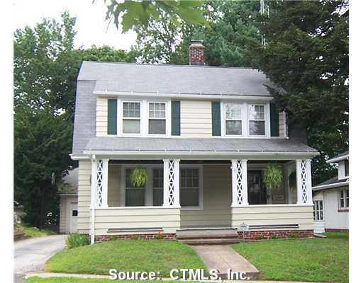 52 Windsor Street Waterbury, CT 06708 - Photo 1 of 1 front view of a house with a yard