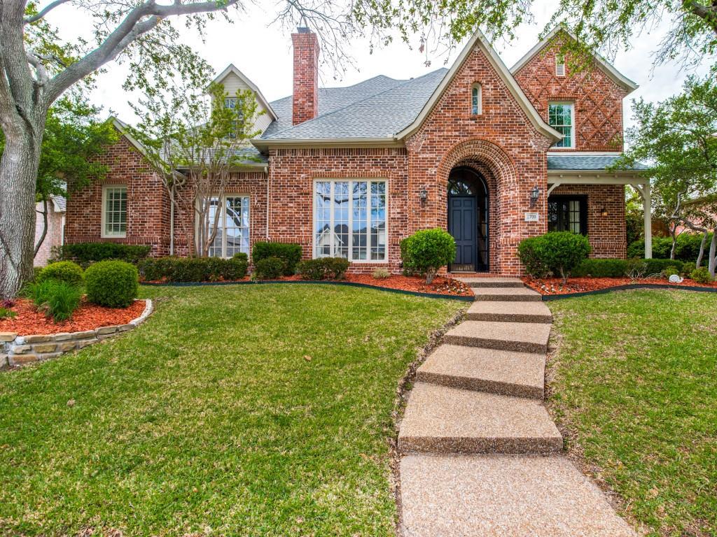 2709 Chambers Lane Plano, TX 75093 - Photo 1 of 1 a front view of a house with a yard
