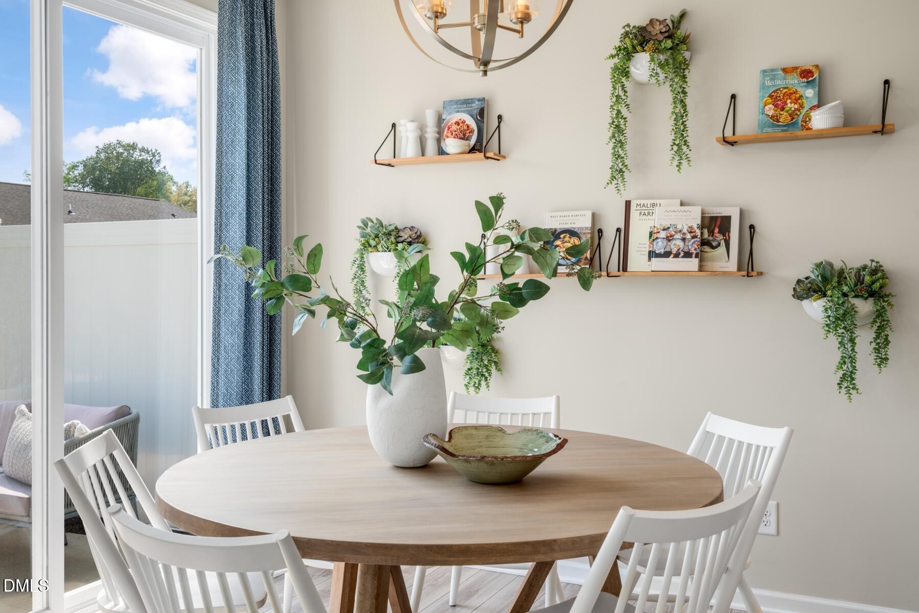 167 Siebold Street Garner, NC 27529 - Photo 13 of 46 a view of a dining room with furniture and wooden floor