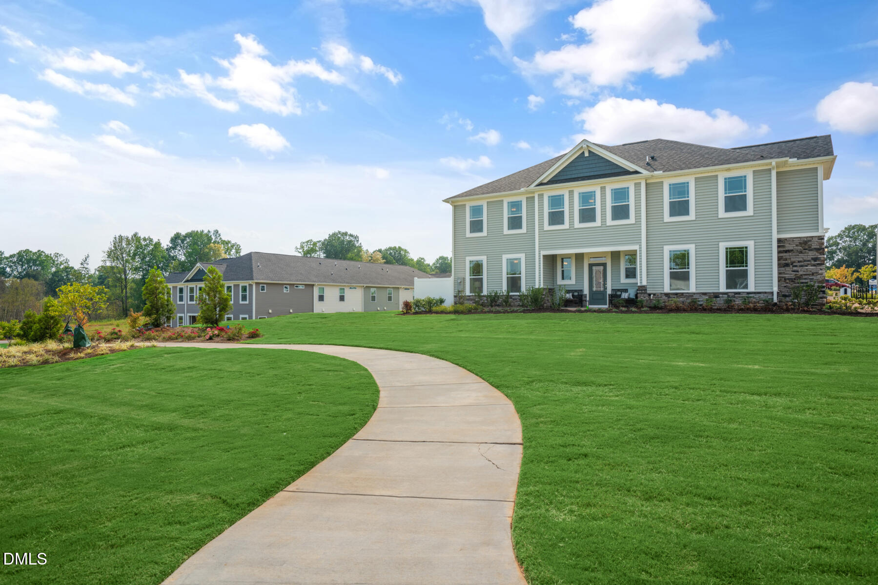 167 Siebold Street Garner, NC 27529 - Photo 17 of 46 a front view of a house with garden