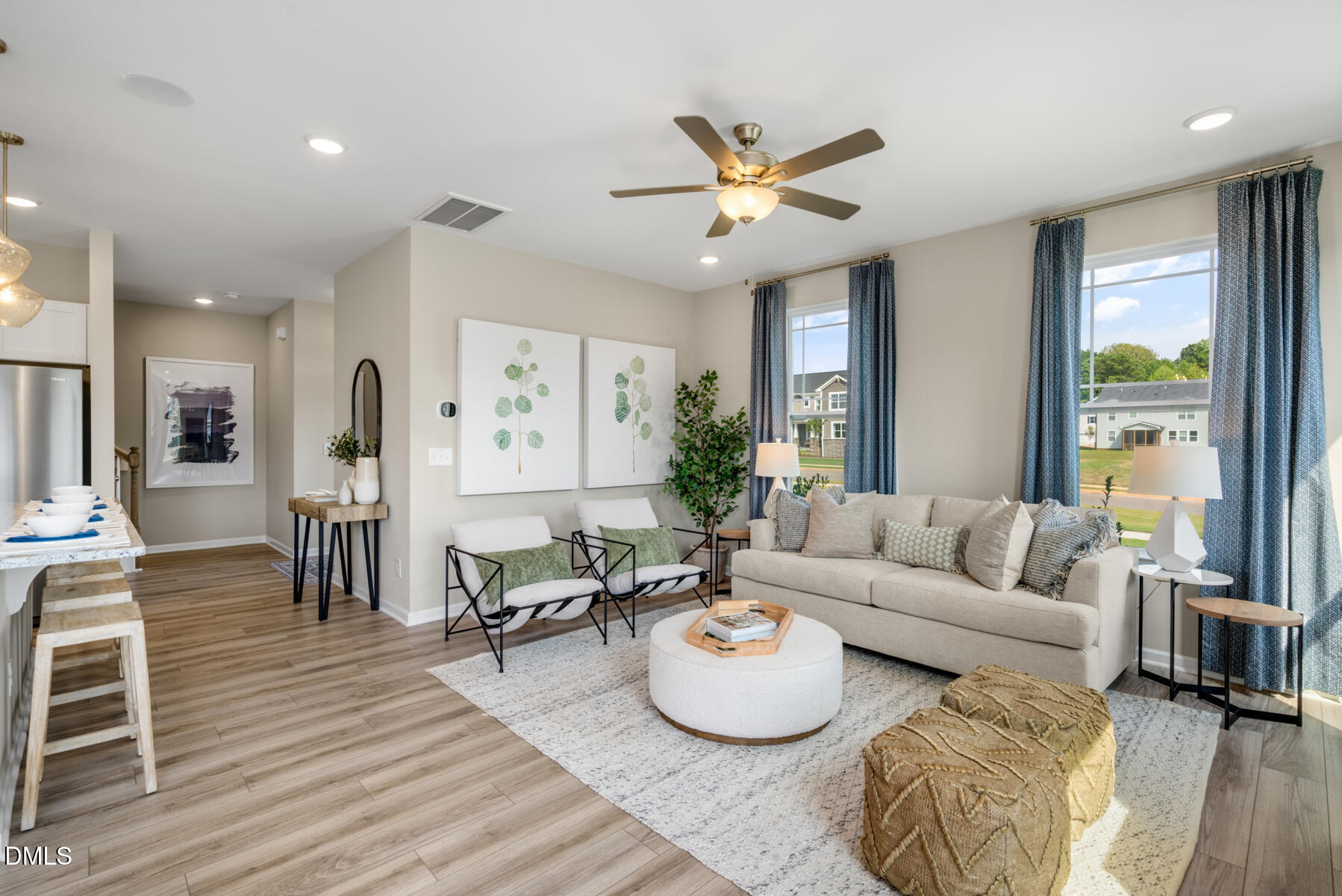 167 Siebold Street Garner, NC 27529 - Photo 20 of 42 a living room with furniture and a large window