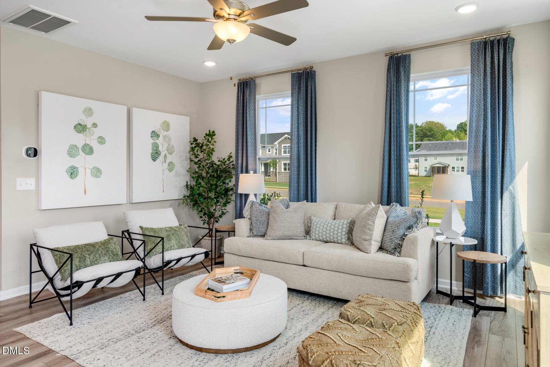 167 Siebold Street Garner, NC 27529 - Photo 25 of 46 a living room with furniture and a large window