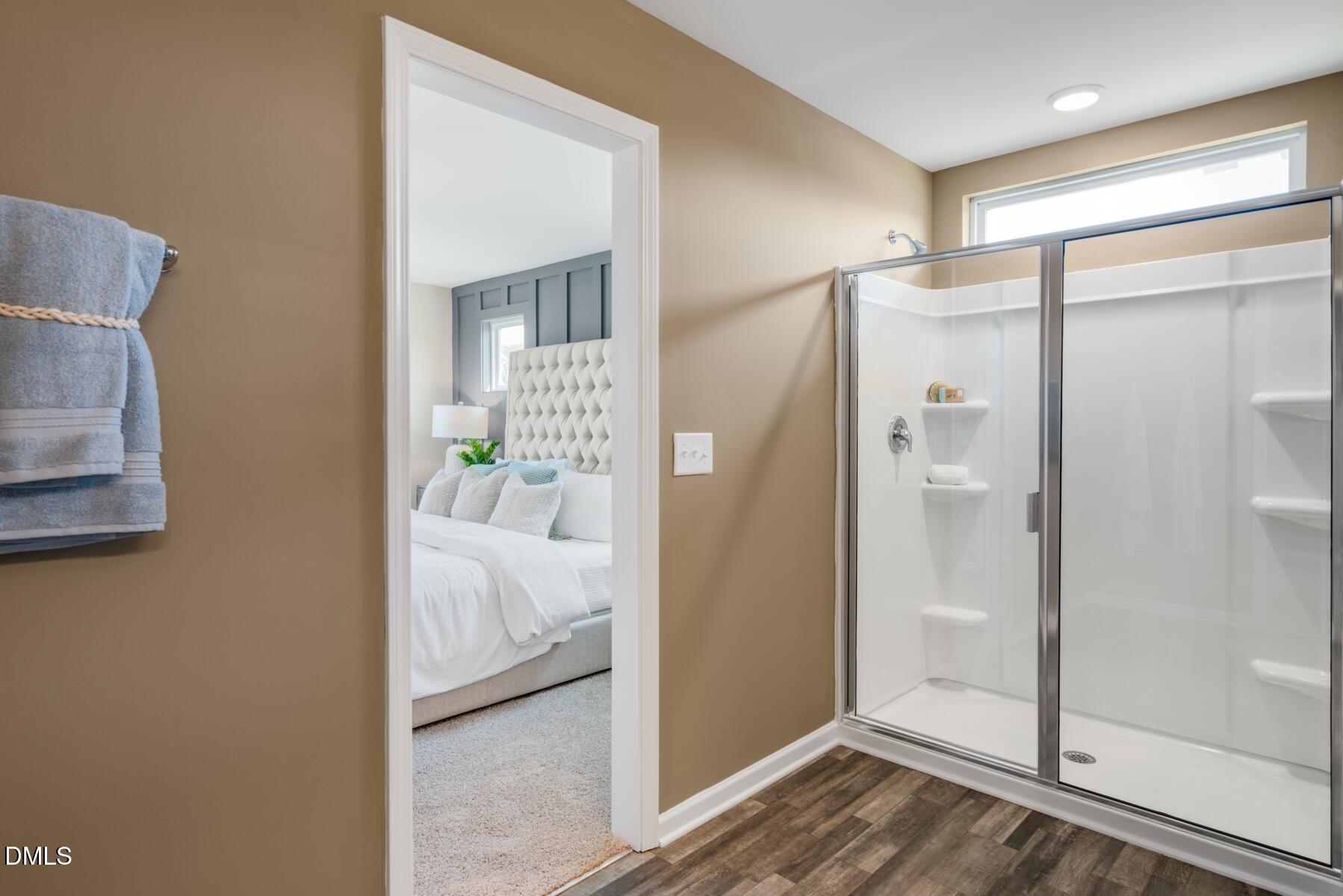 167 Siebold Street Garner, NC 27529 - Photo 35 of 42 a view of a bedroom from a hallway