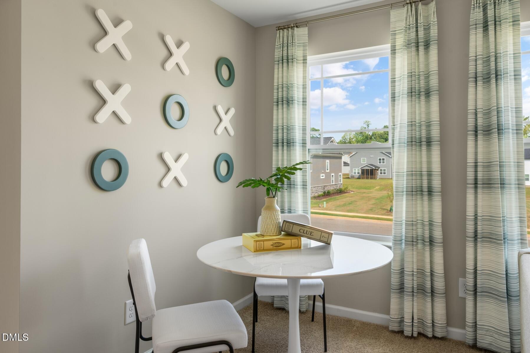 167 Siebold Street Garner, NC 27529 - Photo 37 of 46 a view of a dining room with furniture and window