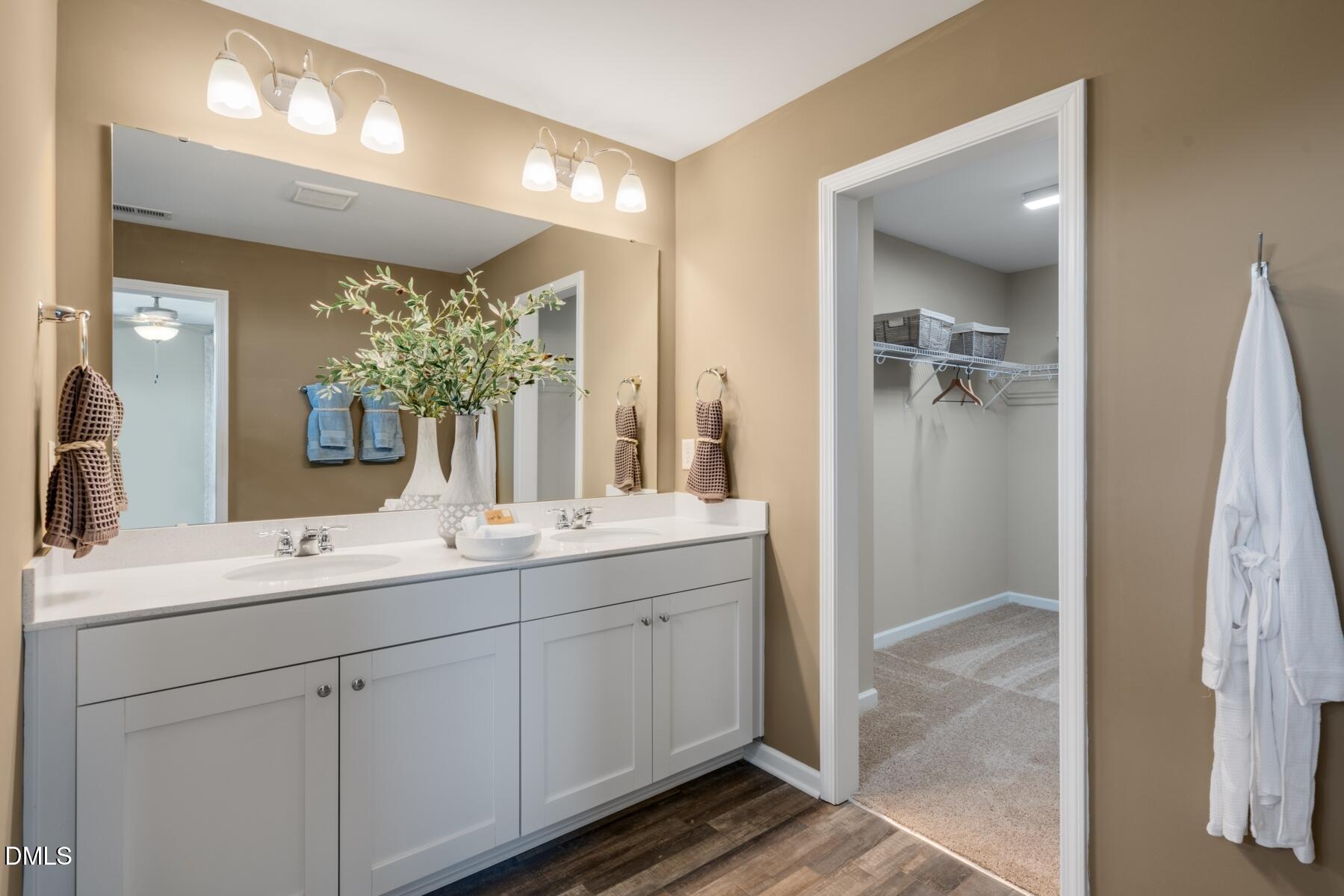 167 Siebold Street Garner, NC 27529 - Photo 38 of 46 a bathroom with a double vanity sink and a mirror