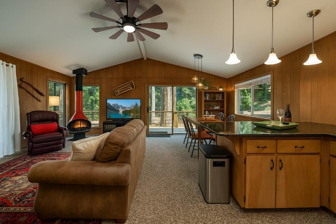 42318 Hanging Branch Road Shaver Lake, CA 93664 - Photo 4 of 13 a living room with furniture a ceiling fan and a window