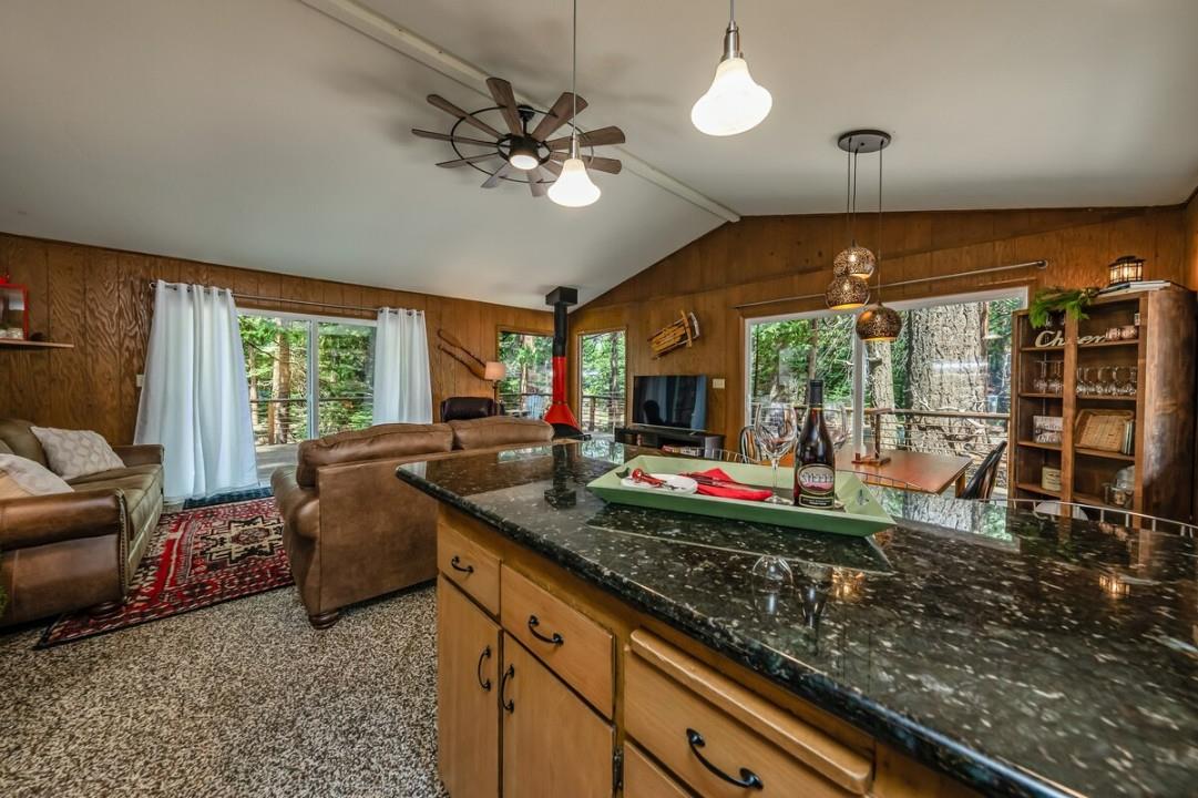 42318 Hanging Branch Road Shaver Lake, CA 93664 - Photo 8 of 13 a kitchen view with a stove and large window