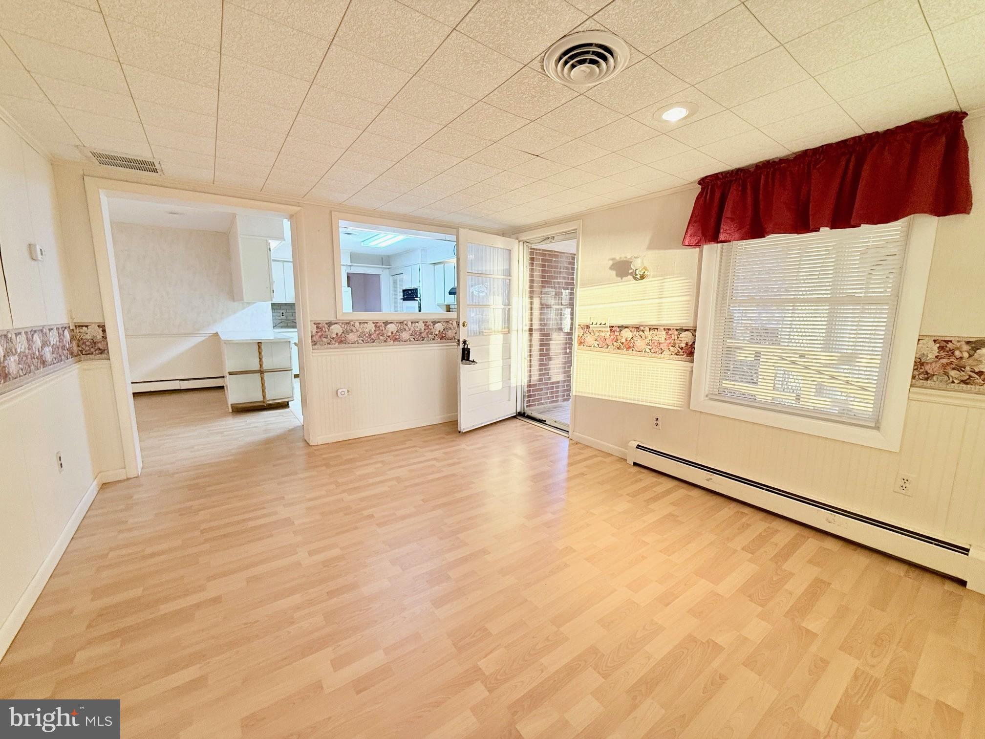 48724 Curleys Road Ridge, MD 20680 - Photo 12 of 44 a view of workspace with furniture and window