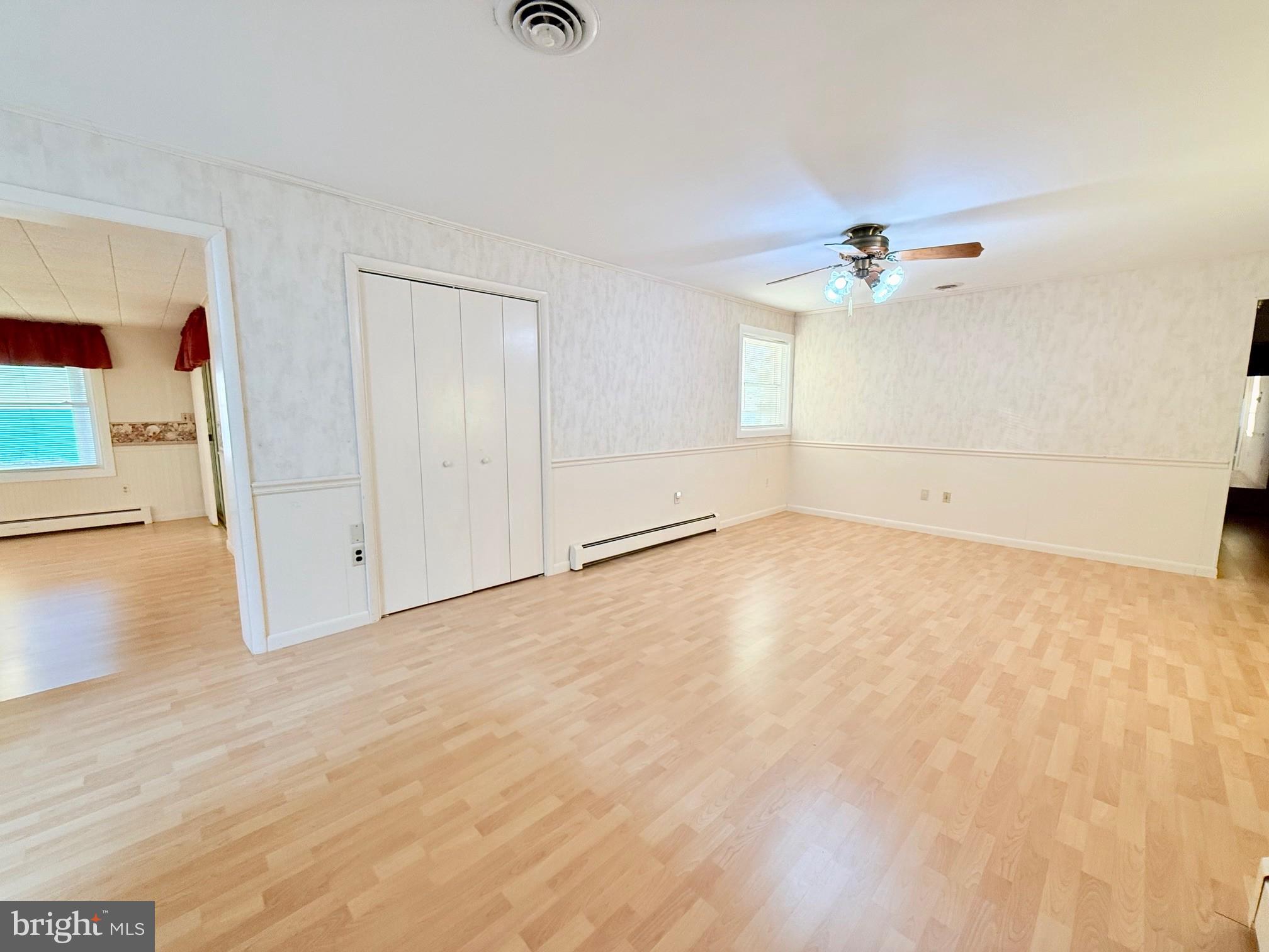 48724 Curleys Road Ridge, MD 20680 - Photo 20 of 44 wooden floor in an empty room