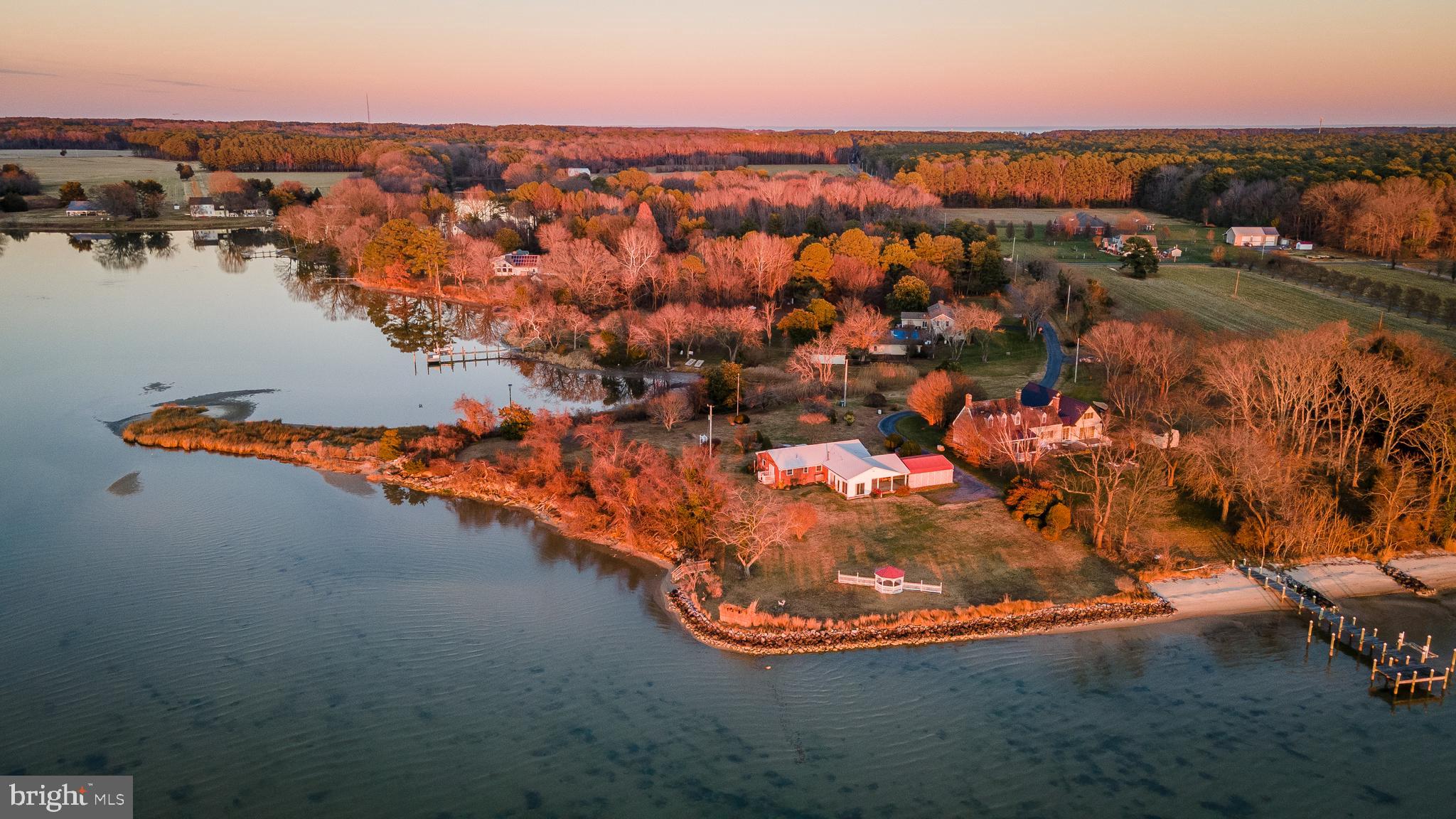 48724 Curleys Road Ridge, MD 20680 - Photo 2 of 44 an aerial view of residential houses with outdoor space