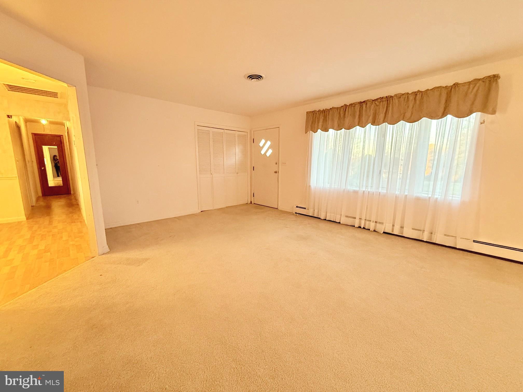 48724 Curleys Road Ridge, MD 20680 - Photo 22 of 44 a view of an empty room with a window