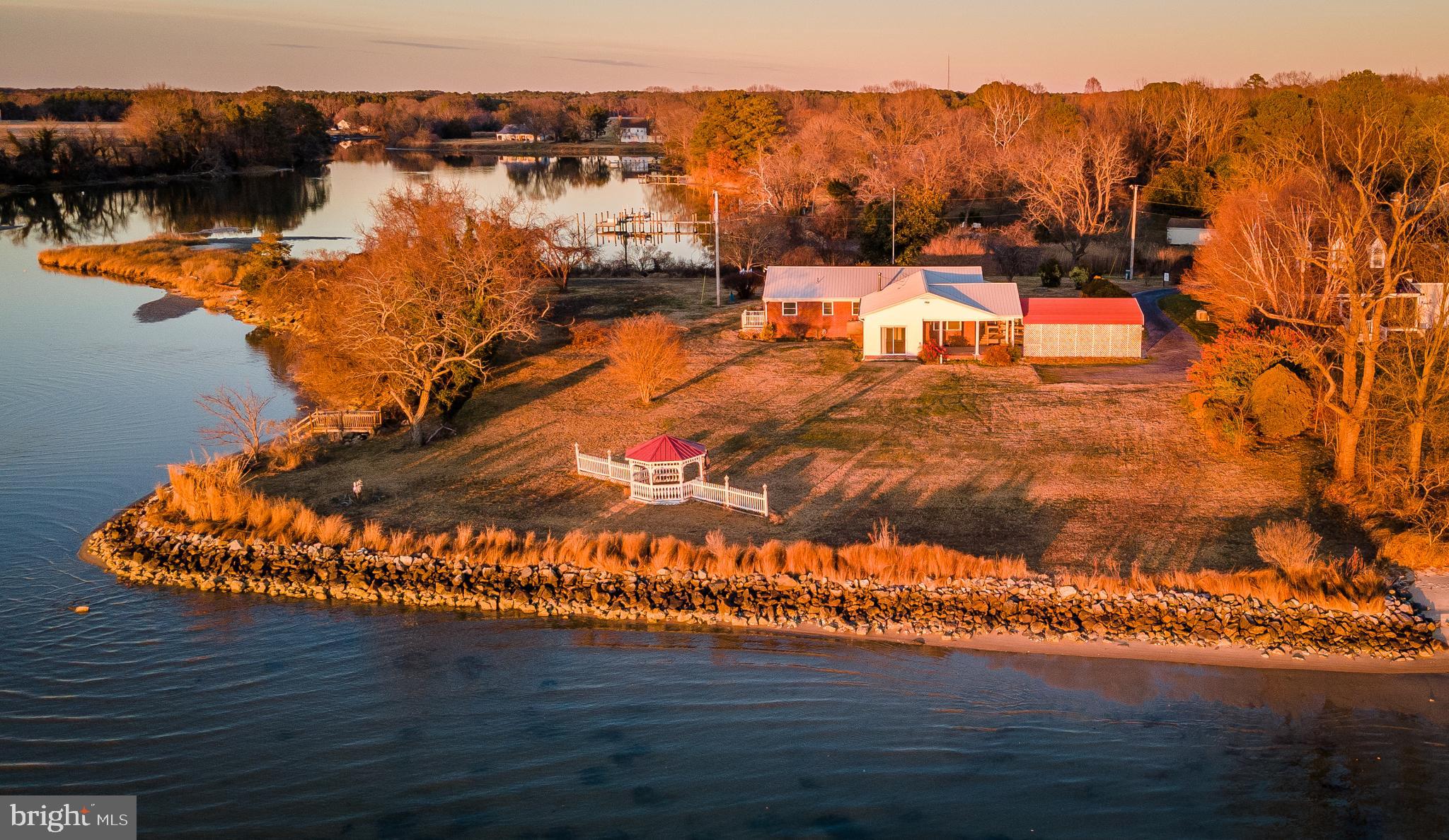 48724 Curleys Road Ridge, MD 20680 - Photo 3 of 44 a view of a lake with a mountain