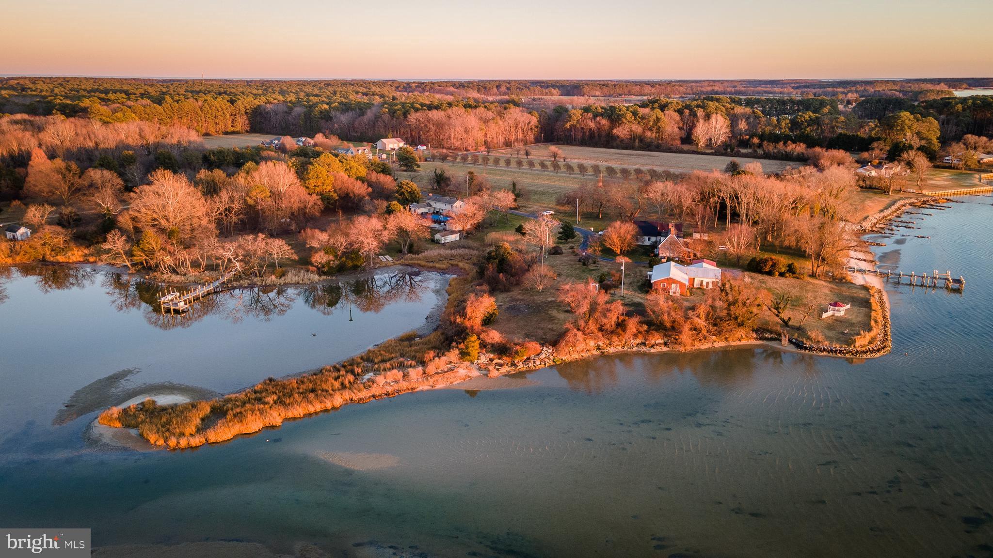 48724 Curleys Road Ridge, MD 20680 - Photo 5 of 44 an aerial view of ocean and residential houses with outdoor space