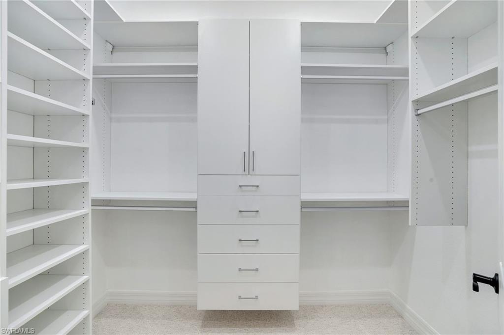 2806 Aviamar Circle Naples, FL 34114 - Photo 15 of 50 a view of an empty walk in closet