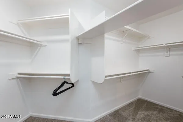 a bathroom with a double vanity sink toilet and shower