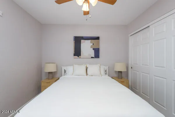 a view of an outdoor sitting area with furniture and umbrella