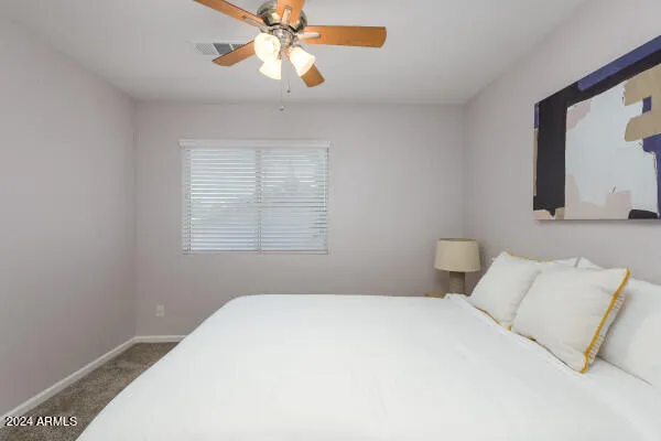 a view of a chairs and table in the patio