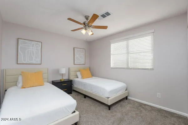 a view of swimming pool with seating area