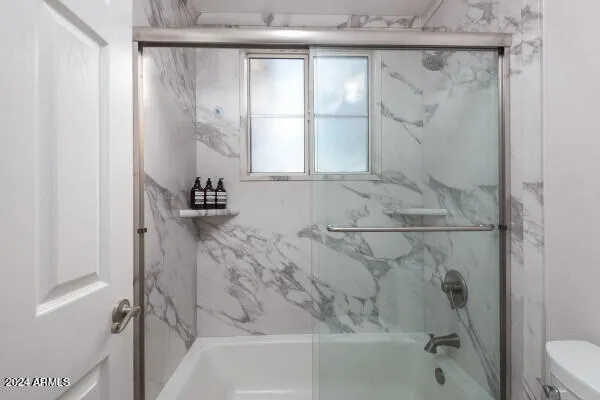 a view of a swimming pool with an outdoor seating