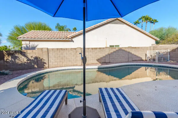 a view of backyard with green space