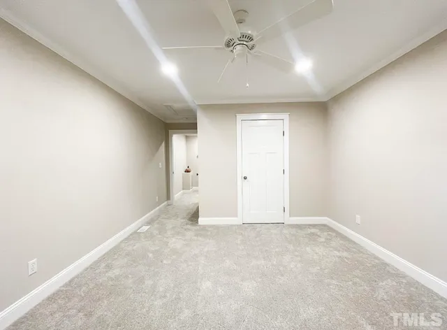 a view of balcony with furniture and wooden fence