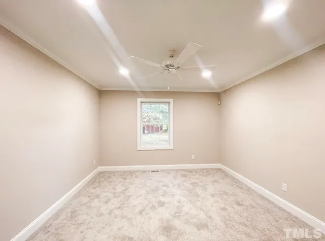 a view of swimming pool with lawn chairs and couches