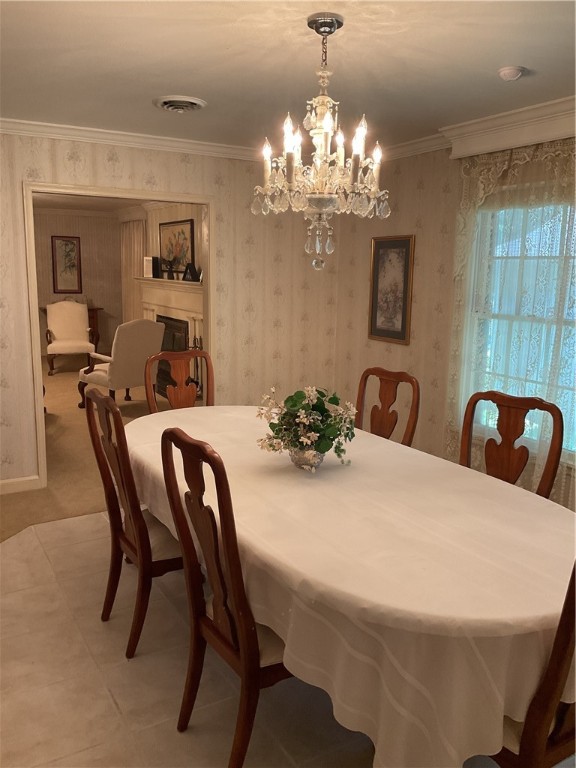 207 Castle Avenue Waco, TX 76710 - Photo 5 of 24 a dining room with furniture and chandelier