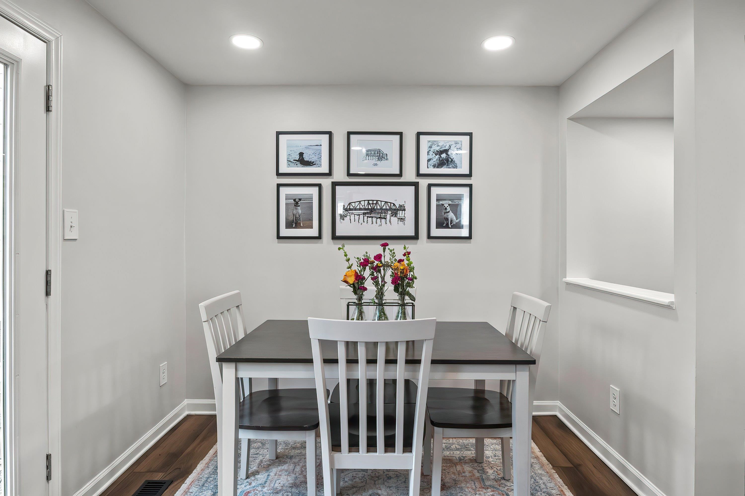 7286 Shellburne Drive Raleigh, NC 27612 - Photo 12 of 35 a view of a dining room with furniture