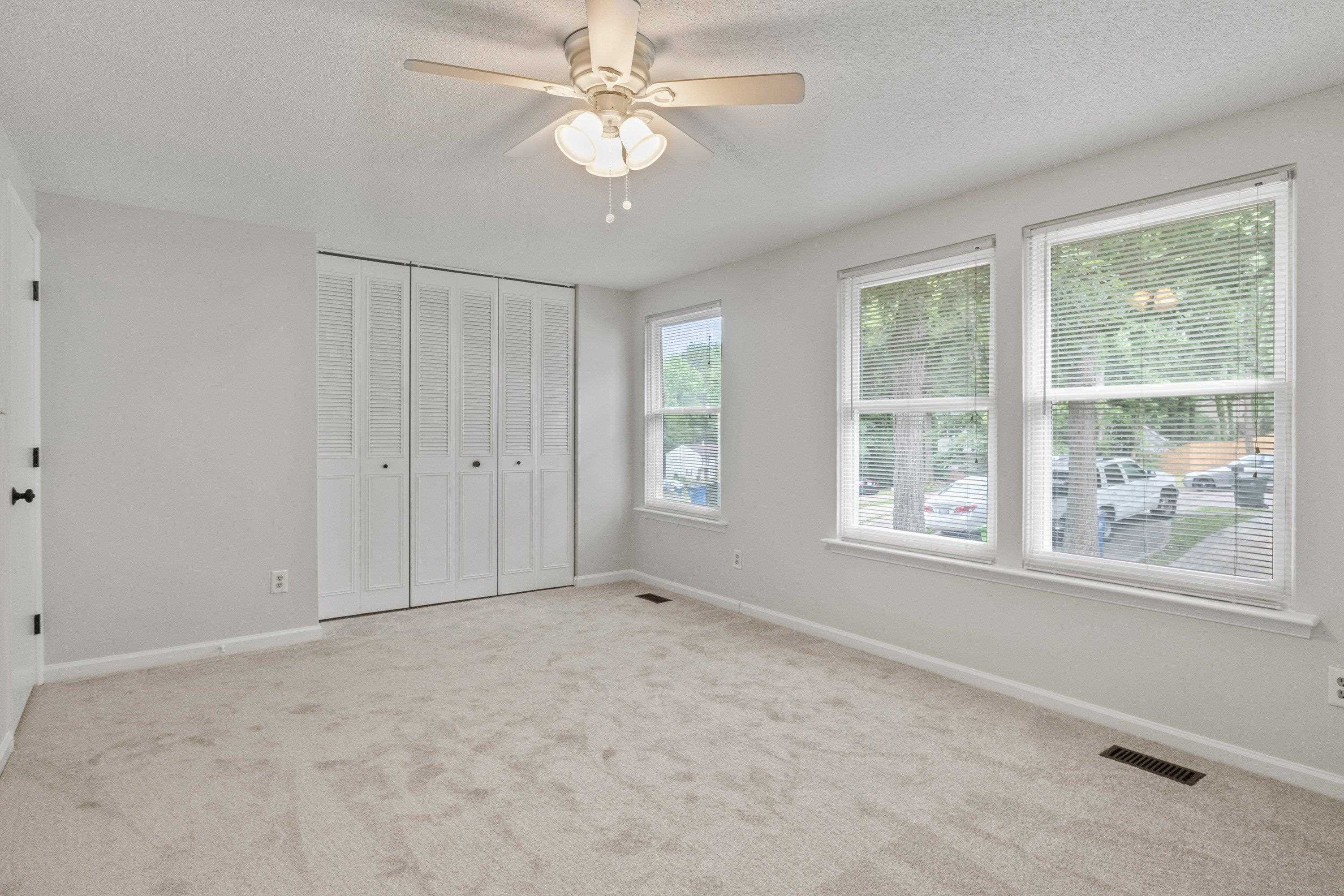 7286 Shellburne Drive Raleigh, NC 27612 - Photo 22 of 35 a view of an empty room with a window