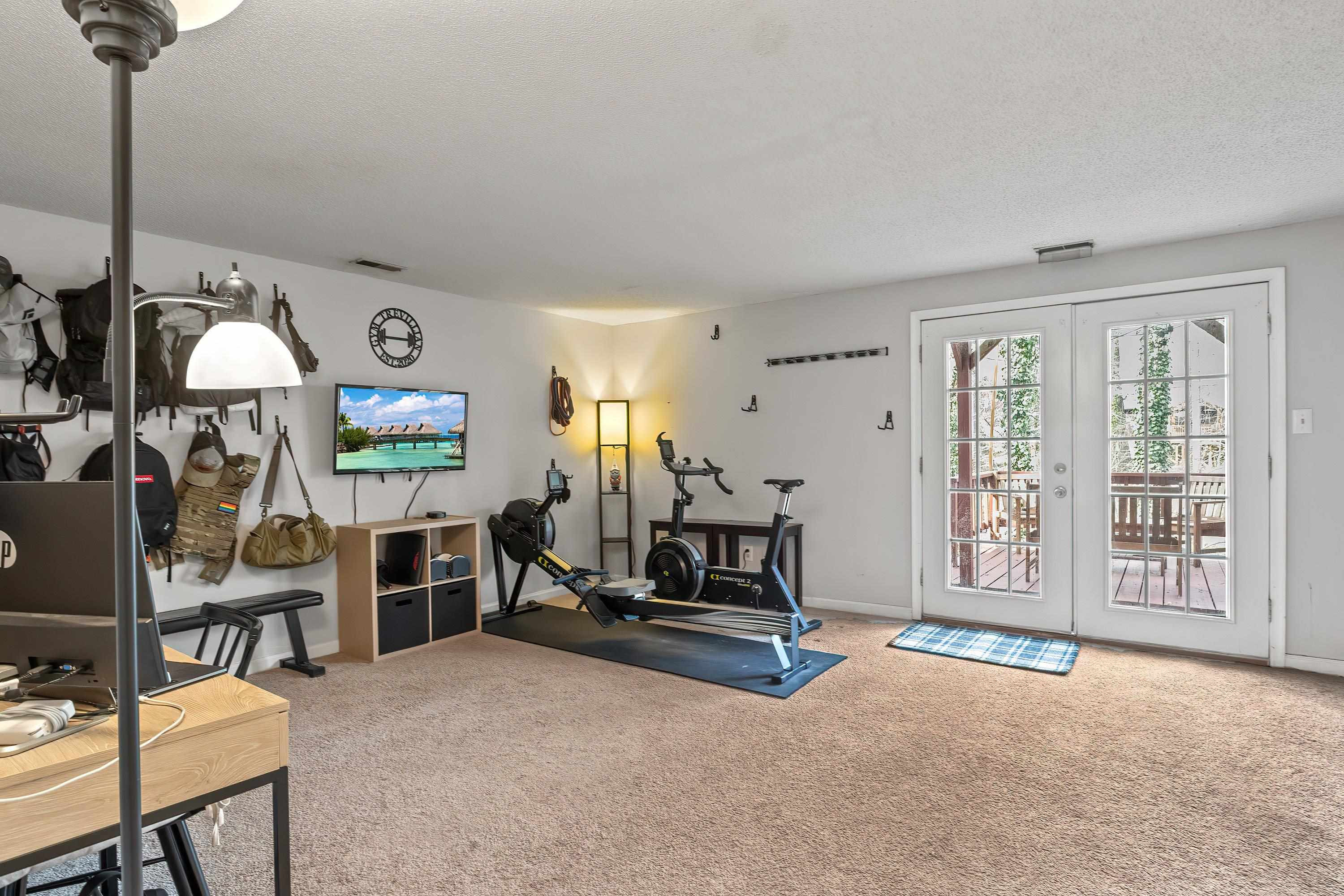 7286 Shellburne Drive Raleigh, NC 27612 - Photo 23 of 35 a view of a livingroom with furniture and windows