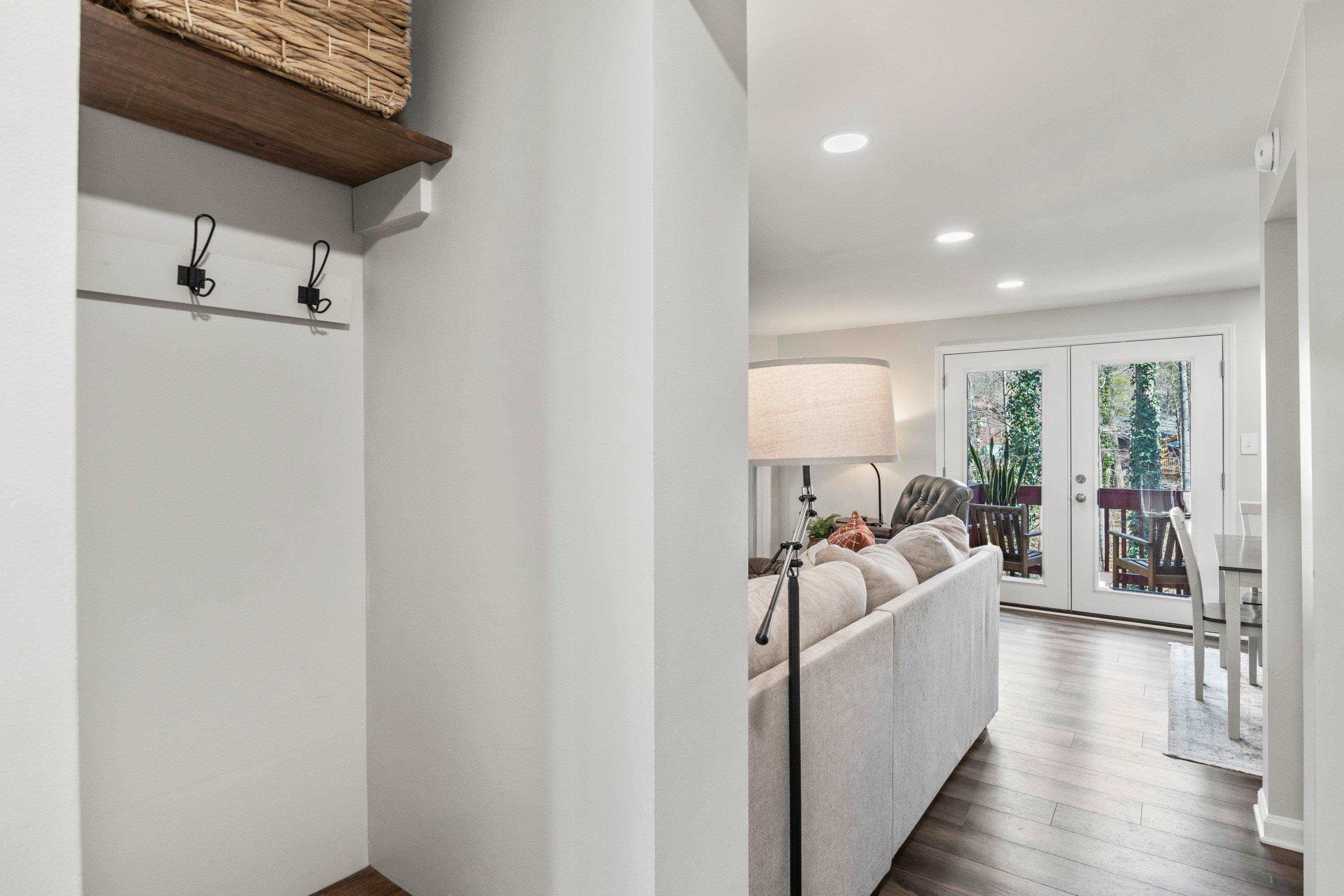 7286 Shellburne Drive Raleigh, NC 27612 - Photo 3 of 35 a living room with furniture and a large window