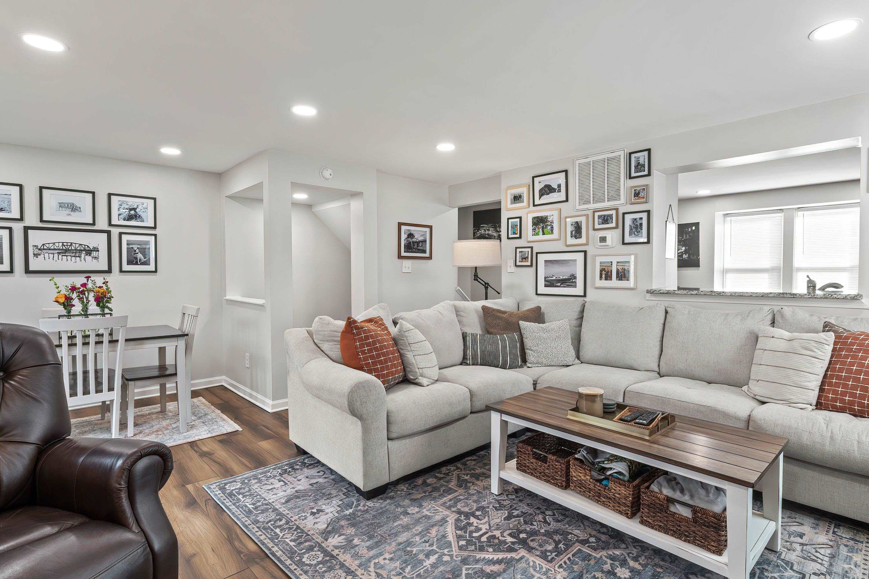 7286 Shellburne Drive Raleigh, NC 27612 - Photo 8 of 35 a living room with furniture and a couch