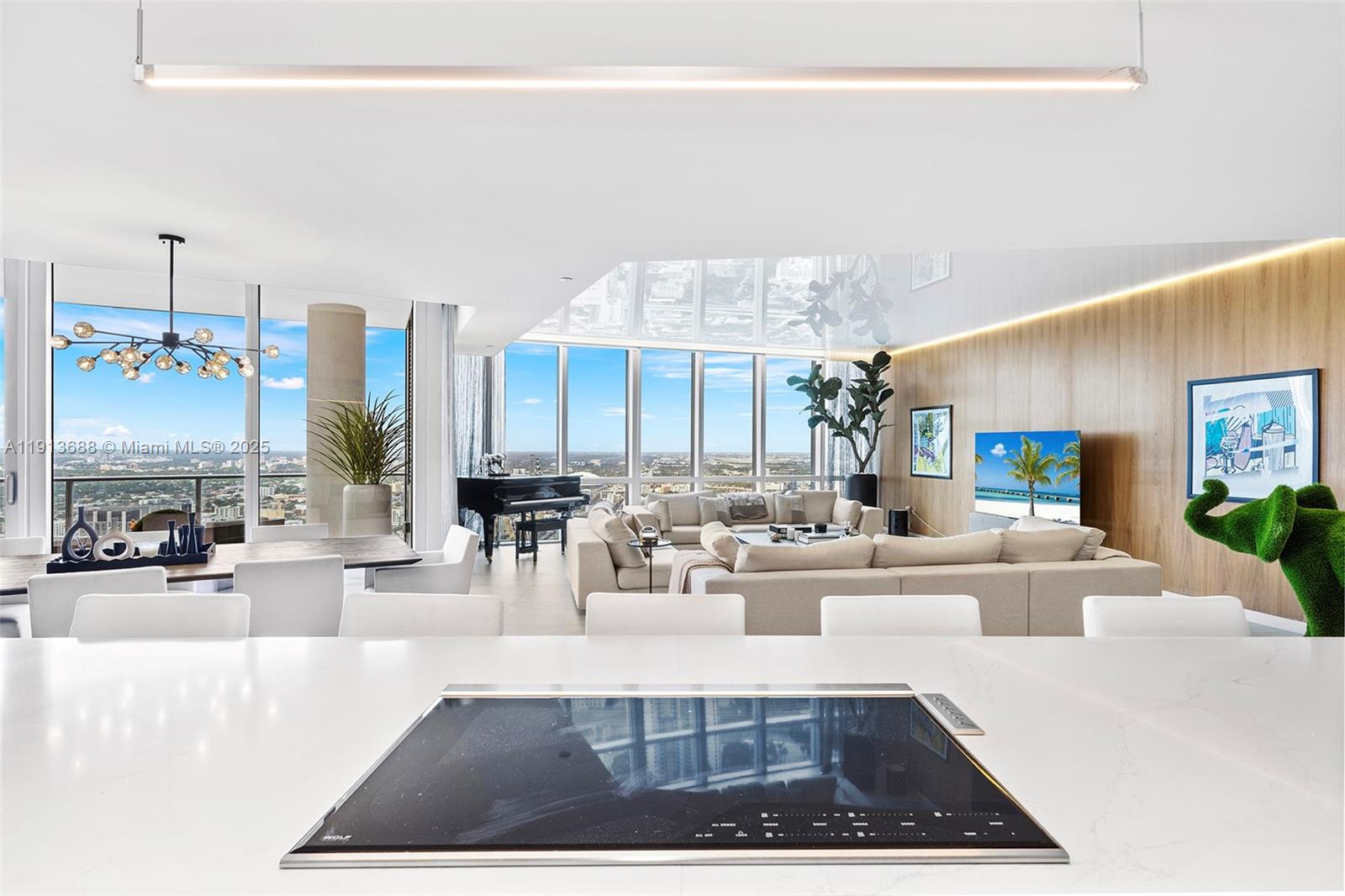 851 Northeast 1st Avenue, Unit 5312 Miami, FL 33132 - Photo 15 of 53 a living room with fireplace furniture and a large window