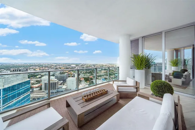 a view of a balcony with city view