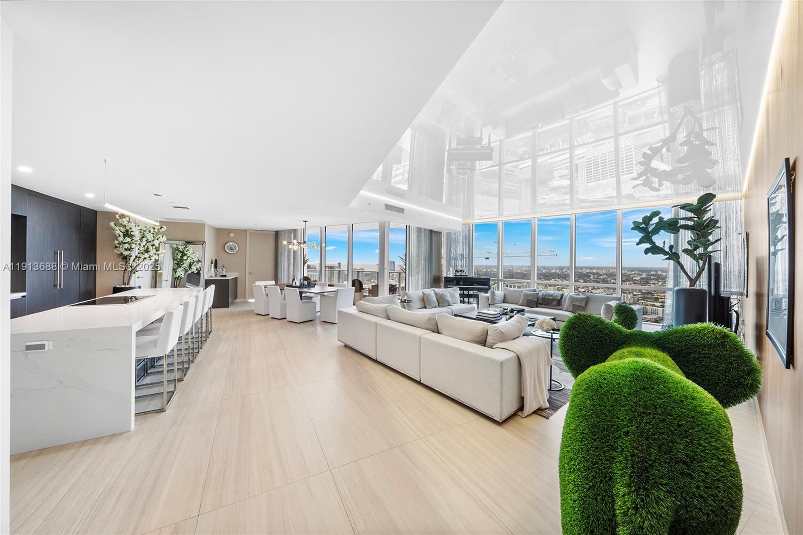 851 Northeast 1st Avenue, Unit 5312 Miami, FL 33132 - Photo 3 of 53 a living room with furniture and a large window