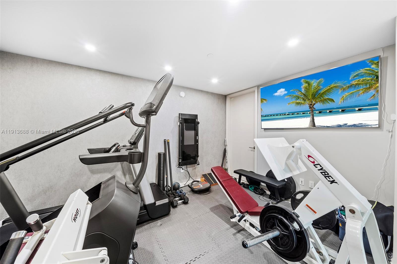 851 Northeast 1st Avenue, Unit 5312 Miami, FL 33132 - Photo 46 of 53 a view of a room with gym equipment