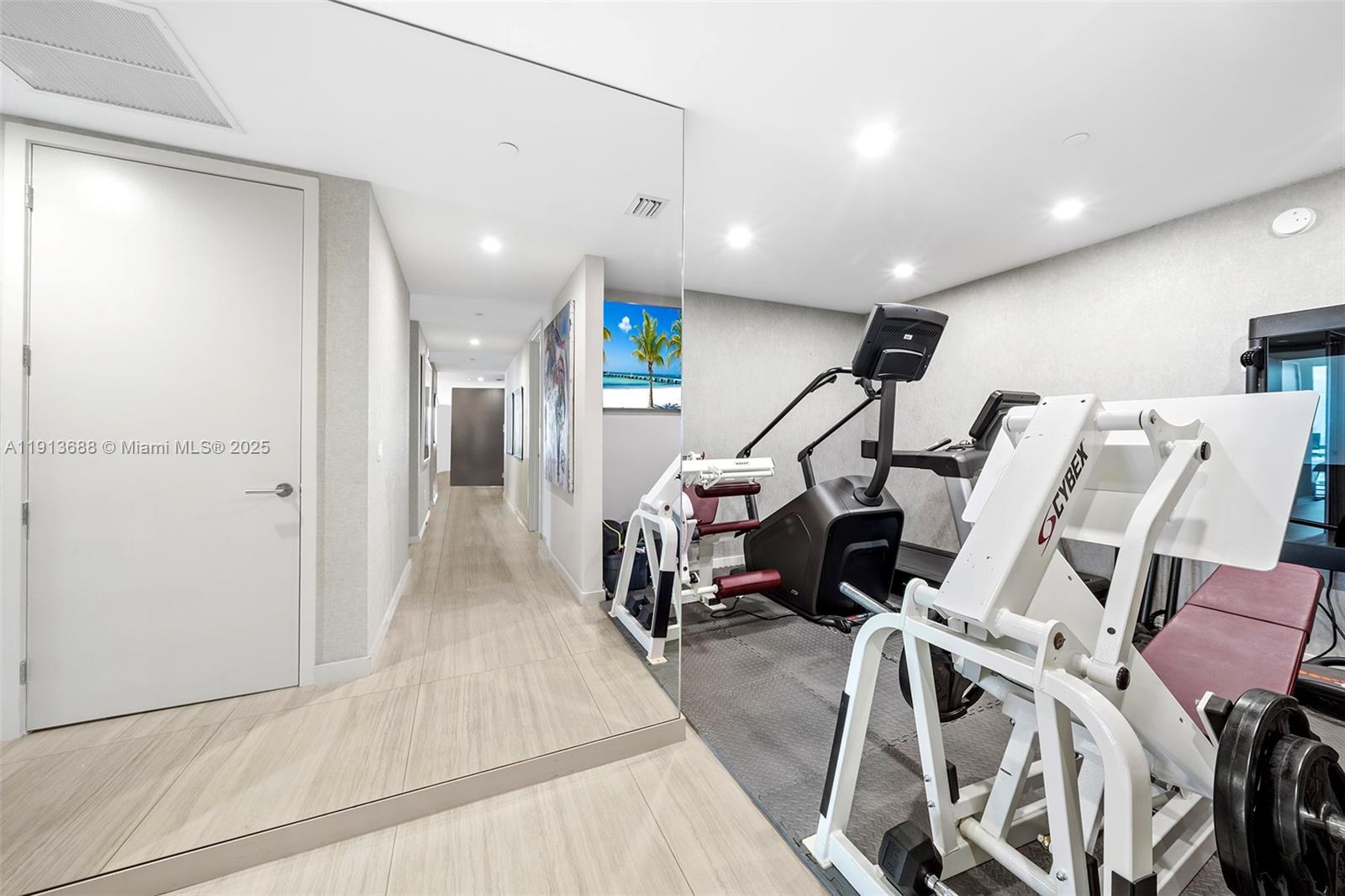 851 Northeast 1st Avenue, Unit 5312 Miami, FL 33132 - Photo 47 of 53 a view of a room with gym equipment