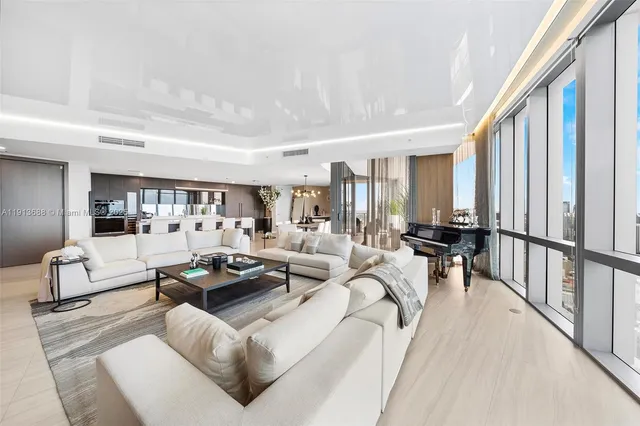 a living room with furniture and a table